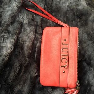 Orange Juicy Couture wristlet